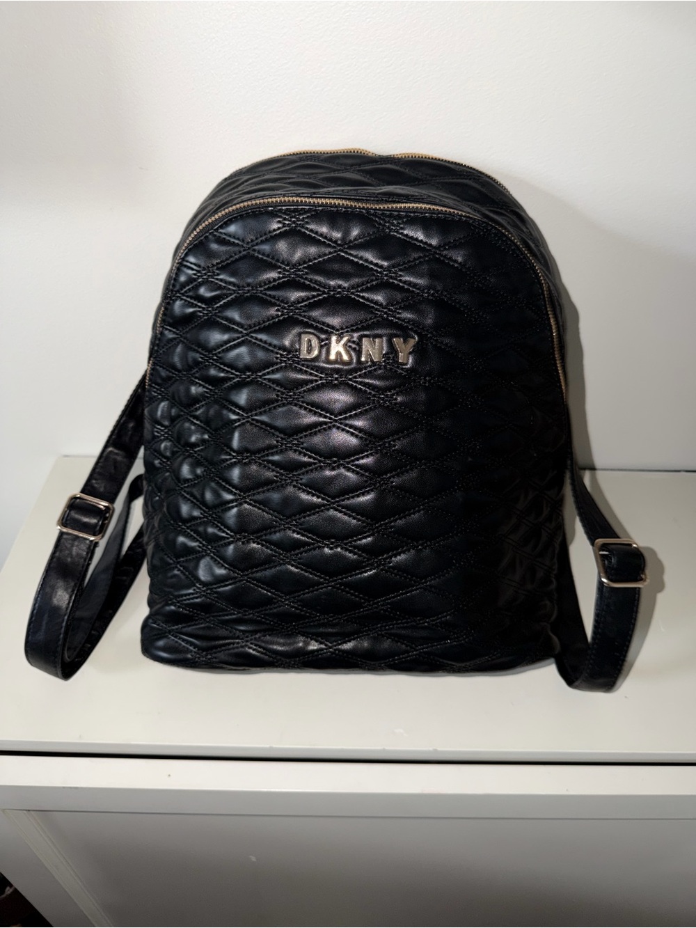 DKNY Black Quilted Backpack Gold Logo Zip Top Adjustable Straps